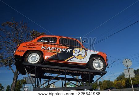 
Old Soviet car ZAZ-965 (Zaporozhets) used as a billboard. October 2, 2019. Kiev, Ukraine