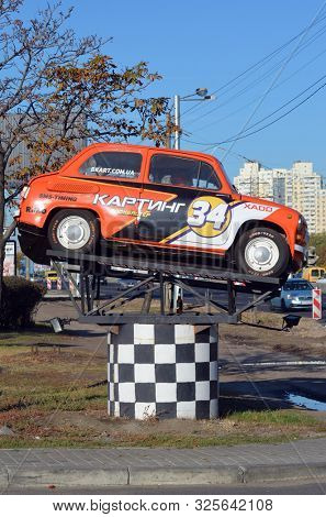 
Old Soviet car ZAZ-965 (Zaporozhets) used as a billboard. October 2, 2019. Kiev, Ukraine
