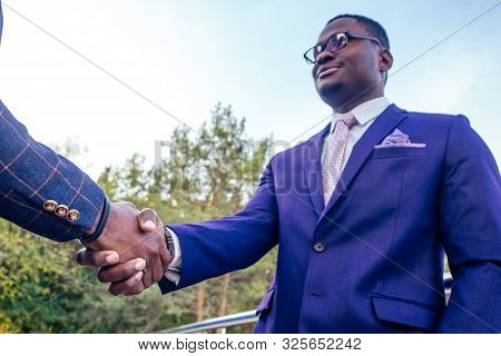 Two Africam American Business Partners Men Meeting From The Plane At The Airport