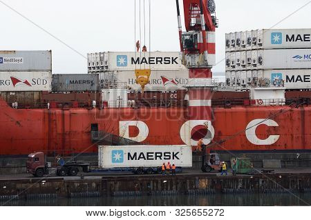 Crane Unloads Container Ship Sevmorput - Russian Nuclear-powered Icebreaker Lighter Aboard Ship Carr