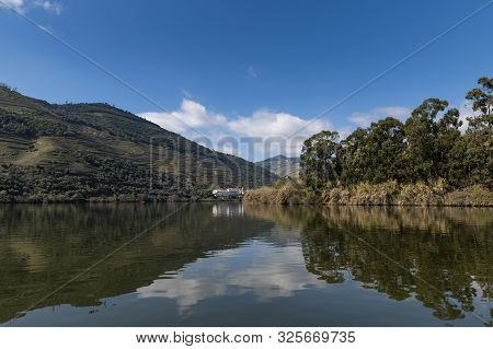 Scenic View Of The Pinhao Village With Terraced Vineyards And The Douro River And The Douro Valley, 