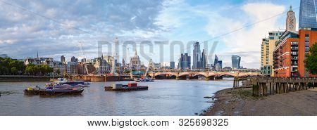 Very high resolution panoramic image of London at sunset with the river Thames, St Paul Cathedral, Blackfriars Bridge and the City - All logos and trademarks removed