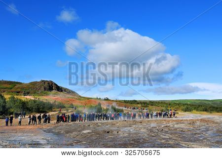 GEYSIR, ICELAND, 14 SEPTEMBER, 2019 : Tourists visiting the famous Geysir area in Iceland, Europe