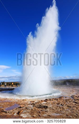 GEYSIR, ICELAND, 14 SEPTEMBER, 2019 : Tourists visiting the famous Geysir area in Iceland, Europe