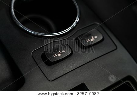 Novosibirsk, Russia - September 11, 2019:  Actyon Ssangyong, Close-up Of Black Of Seat Heating Butto