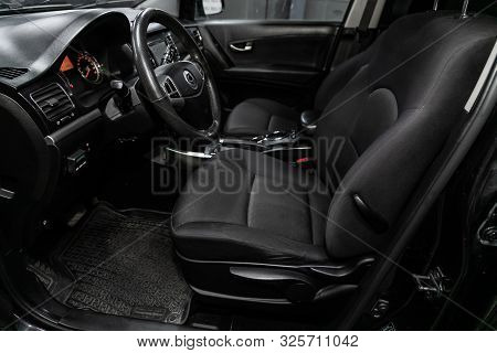 Novosibirsk, Russia - September 11, 2019:  Actyon Ssangyong, Black Luxury Car Interior - Steering Wh