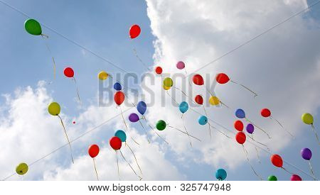 Many Colored Balloons Fly Up Towards The Sky