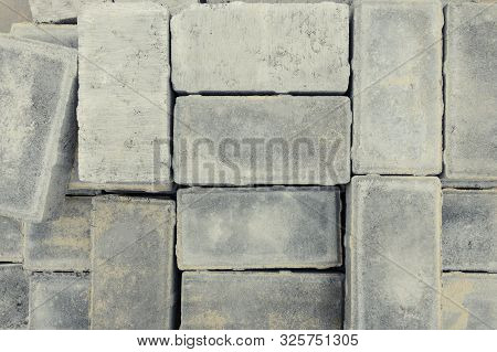 Pavement Tile Folded For The Reconstruction Of A Walkway. Paving Blocks The Main Paving Material For