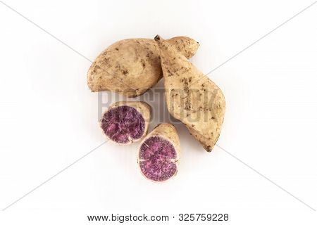 Okinawan Purple Sweet Potatoes On White Background