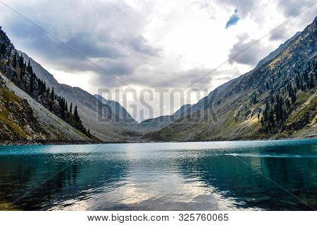 Picturesque Kandol Lake Between Two Hills In Pakistan.