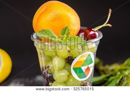 Russia St. Petersburg Greenbox 01102019 Fruit Mix Grape Lemon Cherry Sweet Peach, In A Plastic Conta