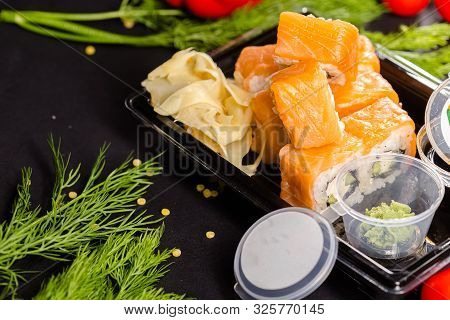 Russia Saint Petersburg Greenbox 01102019 Sushi Rolls Philadelphia Lies On A Square Stone Slate, Wit