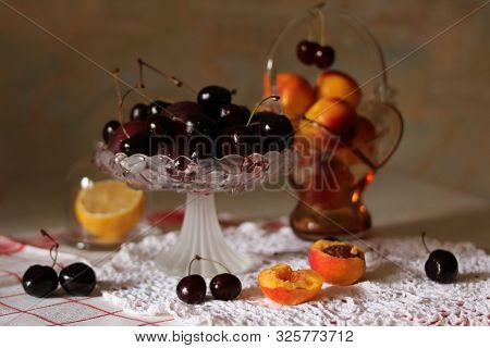 Summer Fruit Plate With Black Cherry And Apricot, Lemon Close Up