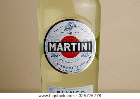 Kharkov, Ukraine - September 23, 2019: Bottle Of Vermouth Martini Rossi Close Up Logo On Beige Wall 