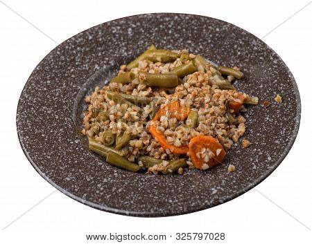 Buckwheat With Green Beans With Garlicand Carrots Isolated On White Background. Diet Breakfast On A 