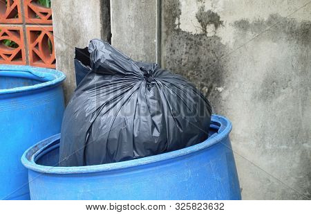 Garbage Bag In Trash Bucket Or Garbage Bin, Wastebin, Recycling Bin For Save The Earth Concept.
