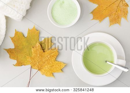 Top View Of Green Tea Matcha In A White Mug. Matcha Ginger Latte. Concept - Healthy Autumn Drinks. C