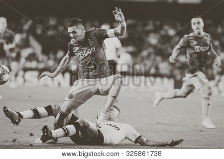 VALENCIA, SPAIN - OCTUBER 2: Tadic with ball during UEFA Champions League match between Valencia CF and AFC Ajax at Mestalla Stadium on Octuber 2, 2019 in Valencia, Spain