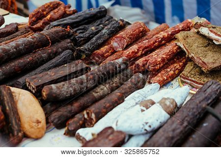 Assortment Of Spicy Dried Or Smoked Beef And Pork Salami, Sausages, Chorizo. Various Kind Types Of S