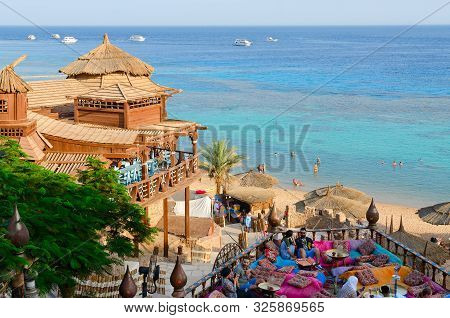 Sharm El Sheikh, Egypt - September 19, 2019: Unidentified People Relax In Popular Farsha Cafe With O