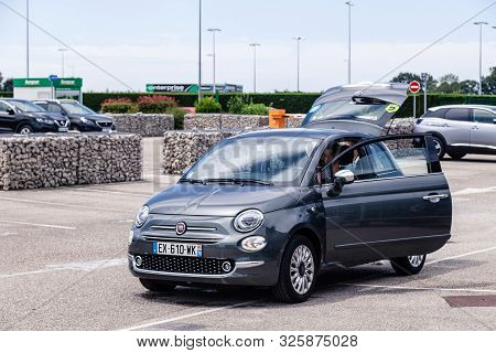 France Lyon 2019-06-18 Small Compact Car Legend Dark Blue Italian Three-door Fiat 500 In Car Rental