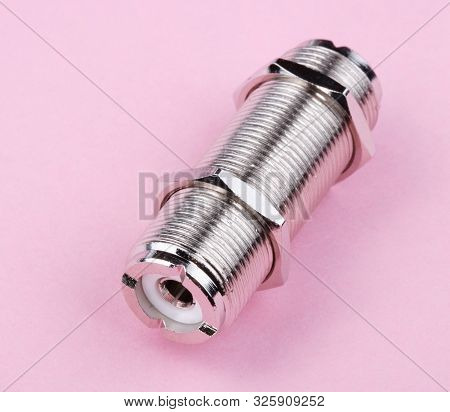 Radio Connector On Pink Background At Dry Sunny Summer Day