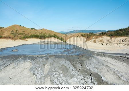 Muddy Volcanoes Paclele Mari Near Buzau, Romania. Mud And Natural-gas Eruptions Create Small Volcano