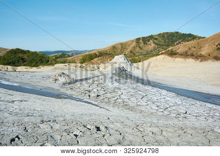 Muddy Volcanoes Paclele Mari Near Buzau, Romania. Mud And Natural-gas Eruptions Create Small Volcano