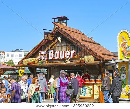 Stuttgart, Germany-september 30, 2018: Beer Festival, Festive Fairground And Rides
