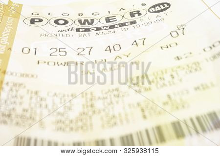 A Stack Of Powerball Lottery Tickets