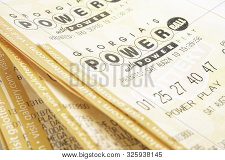 A Stack Of Powerball Lottery Tickets