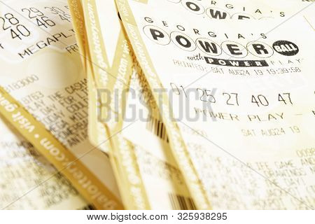 A Stack Of Powerball Lottery Tickets