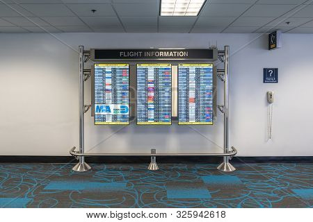 Miami, Usa - September 11, 2019: Monitor At Miami International Airport Lists Scheduled Departing Fl