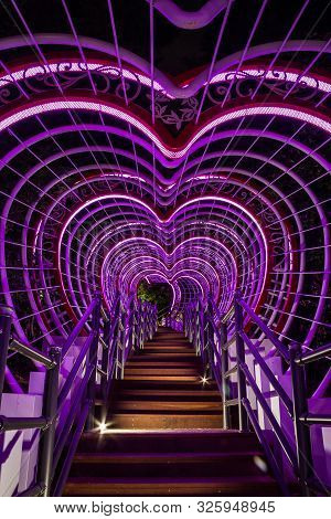A Stairway Leading Through A Tunnel Of Hearts In Jewangsan Park In Chinhae, South Korea