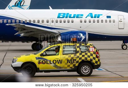 Bucharest, Romania - July 15, 2019: An Yellow Follow Me Dacia Duster Car Is Seen In The Vip Receptio