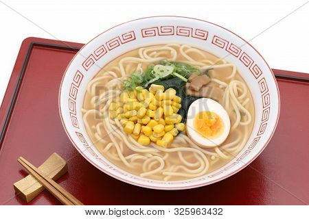 Japanese Miso Ramen Noodles With Chopsticks On Red Tray
