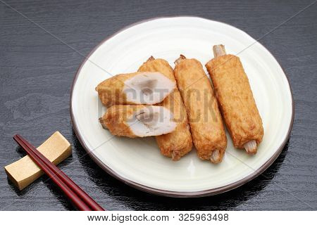 Japanese Food, Gobo Kamaboko On Dish On Black Background