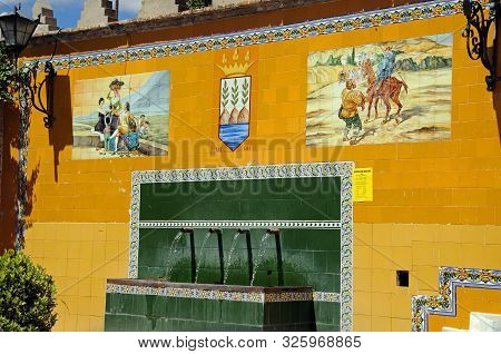 Velez Blanco, Spain - May 5, 2010 - Drinking Fountain With Colourful Ceramic Pictures, Velez Blanco,