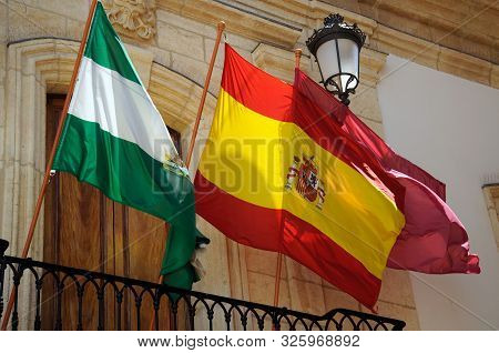 Vera, Spain - May 5, 2010 - Spanish And Andalucian Flags On The Town Hall Balcony, Vera, Almeria Pro