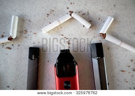 Different Vape Devices Electronic Cigarettes As Smoking Alternatives With Broken Cigarettes And Scat
