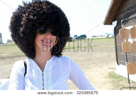 Portrait Of Happy Woman In Russian Papakha Hat