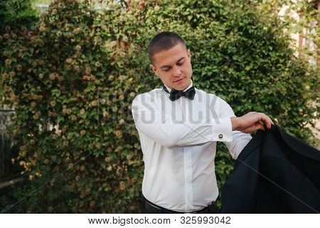 Handsome Groom Dressed His Wedding Blazer. Autumn Weather