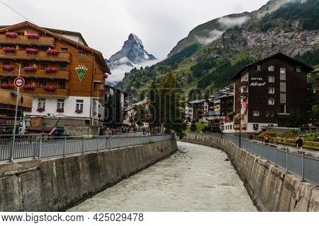 Zermat, Switzerland - August 12 2019: Shopping Street In Zermatt City.