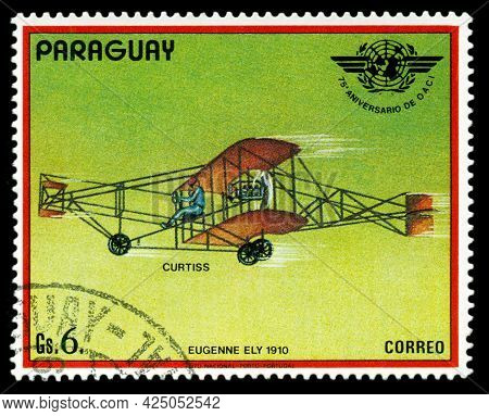 Stavropol, Russia - June  27  2021:: A Stamp Printed By Paraguay,  Shows  Old Plane  Curtiss , Serie