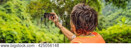 Banner, Long Format Man Tourist In Trang An Scenic Landscape Complex In Ninh Binh Province, Vietnam 