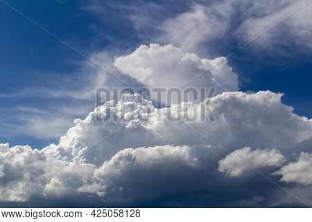 Big Cummulus White Cloud On Blue Sky