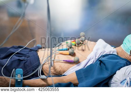 Ecg Or Ekg Of Man With Electrodes For Electrocardiogram Records On Bed In Hospital