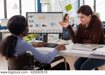 Businesswomen Planning Financial Strategy Looking On Computer Working Together In Start Up Company O