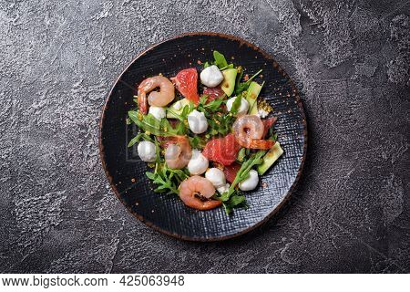 Healthy Salad With Fresh Arugula, Mozzarella Cheese, Tasty Shrimps, Grapefruit And Avocado