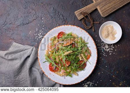 Pasta With Shrimps, Cherry Tomatoes, Arugula Leaves And Onion